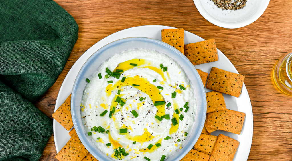 Whipped Lemon Garlic Ricotta Dip served with Mary’s Gone Crackers Olive Oil & Black Pepper REAL THIN Crackers.